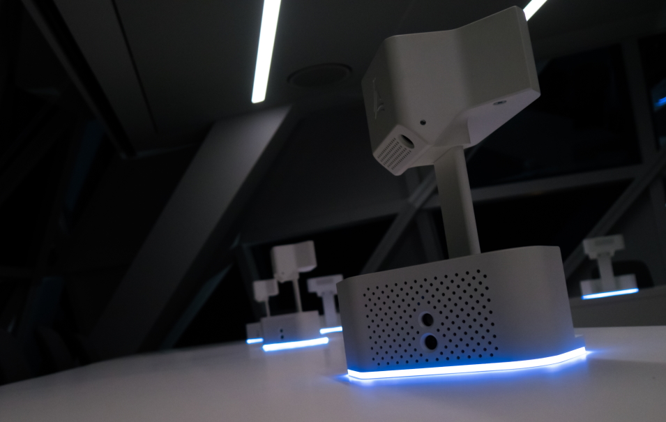 Hardware design for multimedia setup with glowing blue base units