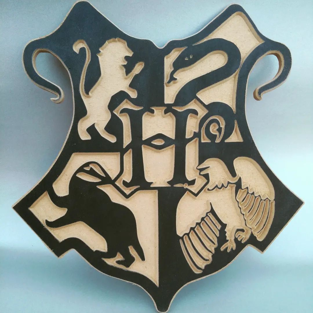 CNC-milled Hogwarts crest sign in two-layer MDF — home CNC project